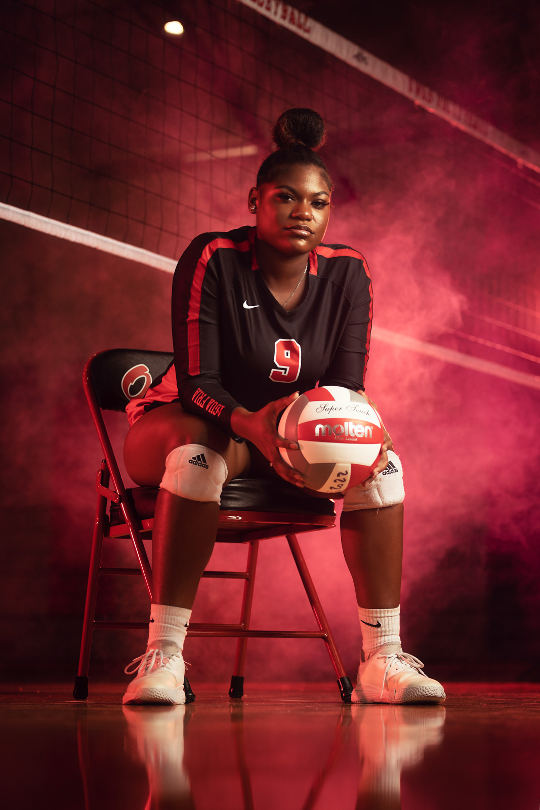 Volleyball player with red smoke — Media Day