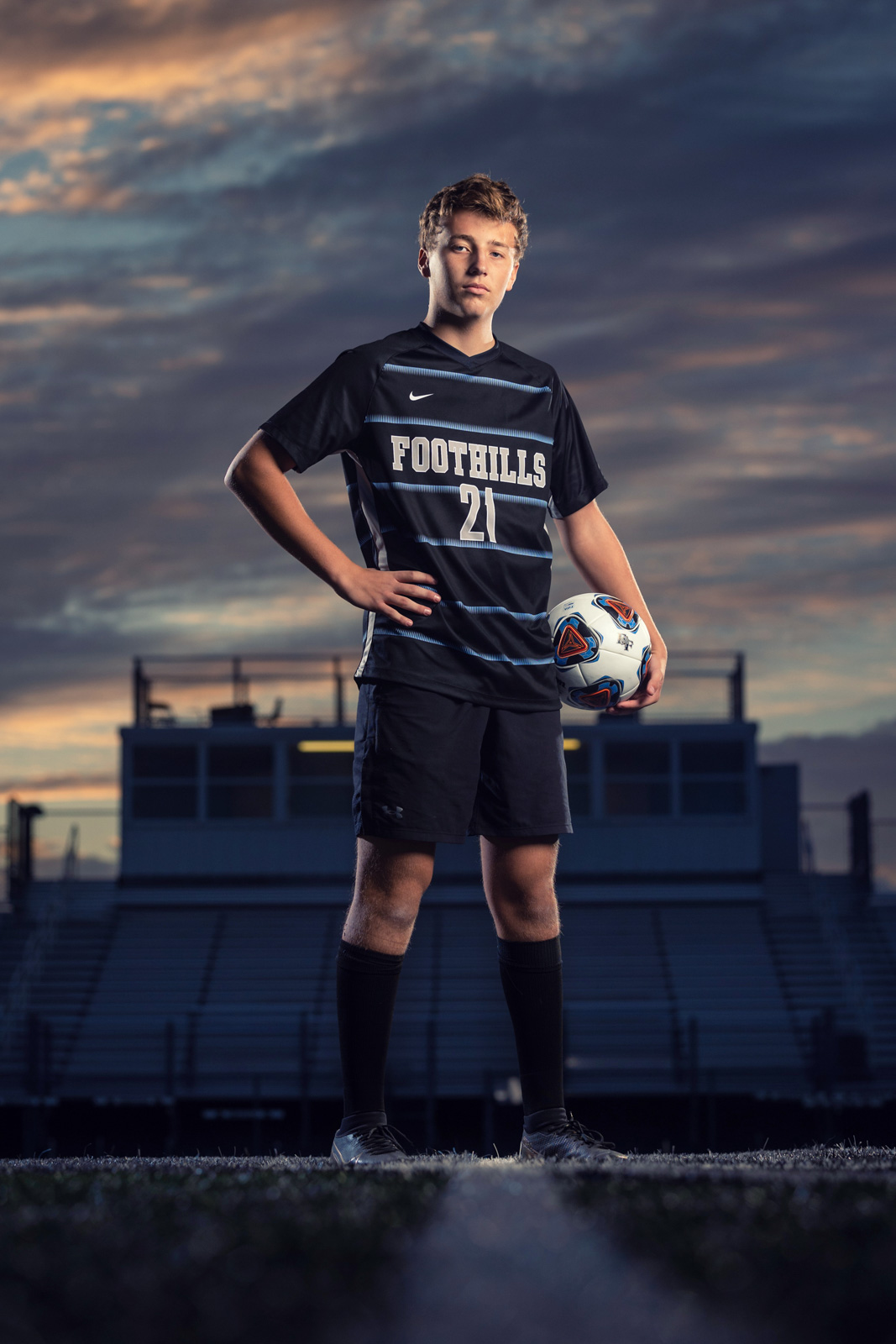 Foothills soccer player at sunset — natural shoot